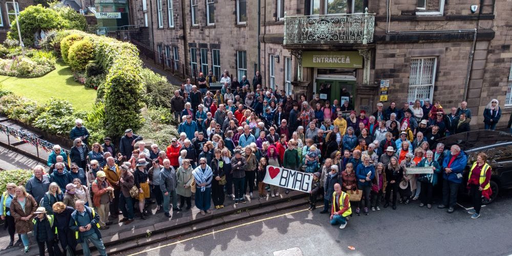 Drone image of mass gathering in support of Buxton Museum & Art Gallery. Image courtesy of Explore Buxton.