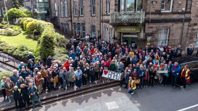 Drone image of mass gathering in support of Buxton Museum & Art Gallery. Image courtesy of Explore Buxton.