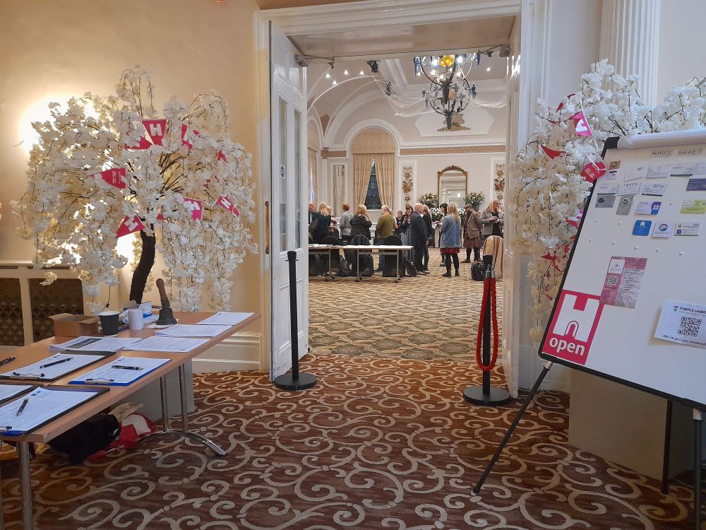 Registration table for the networking meeting at The Palace Hotel in 2024 Registration table for the networking meeting at The Palace Hotel in 2024